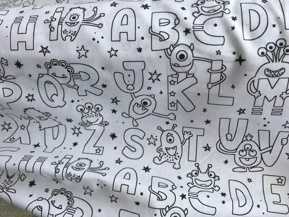 jane-couture-tissus-en-vente-coloriage-alphabet-tissu-coton-150cm image 1